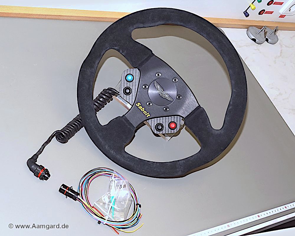 Aston Martin steering wheel with Aamgard electric panel